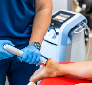 Shockwave therapy applied to a patient's heel