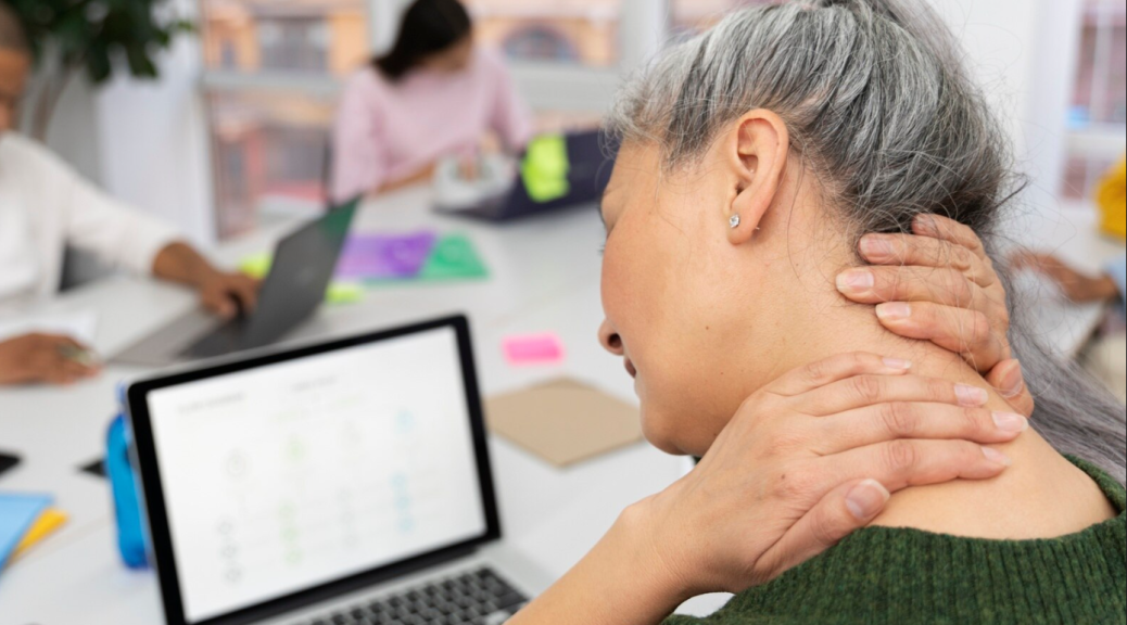 showing a woman with pain from a stiff neck, causing cervicogenic headaches